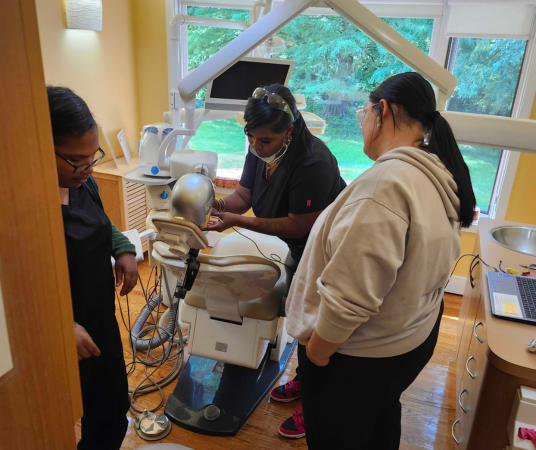 Dental assistant student training at College Station Dental Assistant School